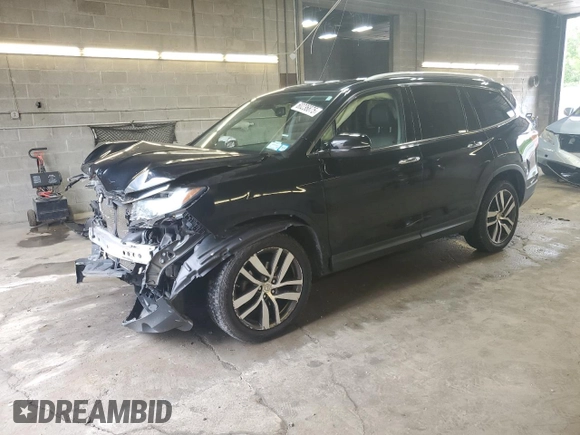2017 Honda Pilot Touring z VIN 5FNYF6H91HB011030, wystawiony jako Copart lot #60236875 z przebiegiem 119 909 mil mil oraz Szkoda całkowita • Salvage title. Historia ofert i sprzedaży dostępna na DreamBid. Obrazek 1.