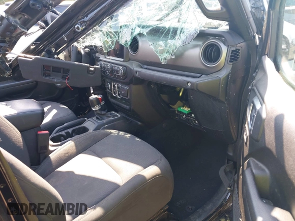 2023 Jeep Gladiator Sport S z VIN 1C6HJTAG2PL544870, wystawiony jako IAAI lot #42155013 z przebiegiem Nie podano mil oraz . Historia ofert i sprzedaży dostępna na DreamBid. Obrazek 5.