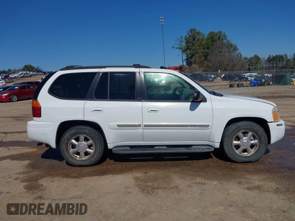 2002 GMC Envoy SLT with VIN 1GKDS13S622507379, listed as a IAAI auction lot 41641163 with 201,089 mi miles. Bid and sale history available at carsss.com. Image 13.