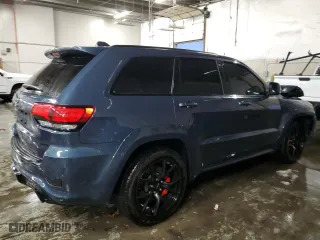 2021 Jeep Grand Cherokee SRT with VIN 1C4RJFDJ2MC606186, listed as a Copart auction lot 79479704 with 39,349 mi miles and Salvage Title. Bid and sale history available at carsss.com. Image 3.