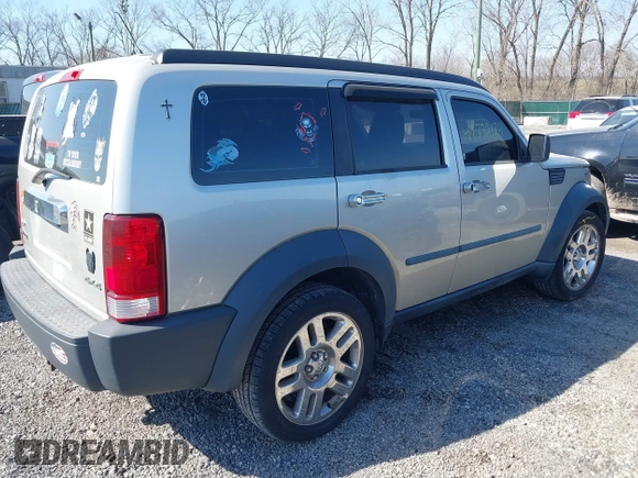 2008 Dodge Nitro SXT with VIN 1D8GU28K68W271921, listed as a IAAI auction lot 41772124 with 233,078 mi miles. Bid and sale history available at carsss.com. Image 4.