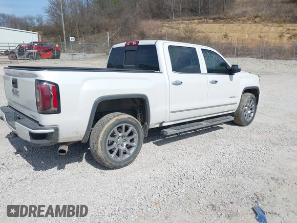 2017 GMC Sierra 1500 Denali with VIN 3GTU2PEC5HG164021, listed as a IAAI auction lot 41784101 with 69,167 mi miles and . Bid and sale history available at DreamBid. Image 4.