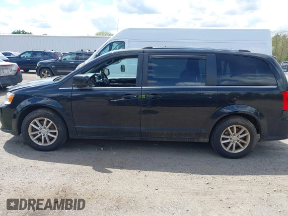 2018 Dodge Grand Caravan SXT with VIN 2C4RDGCG1JR324739, listed as a IAAI auction lot 42230796 with 197,584 mi miles and . Bid and sale history available at DreamBid. Image 14.