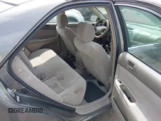 2002 Toyota Camry LE z VIN JTDBE32KX20070778, wystawiony jako IAAI lot #42389584 z przebiegiem 278 070 mil mil oraz . Historia ofert i sprzedaży dostępna na DreamBid. Obrazek 8.