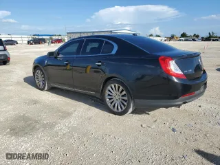 2014 Lincoln MKS with VIN 1LNHL9EK6EG604428, listed as a Copart auction lot 59758884 with 122,833 mi miles and Salvage Title. Bid and sale history available at carsss.com. Image 2.