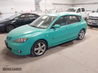 2005 Mazda Mazda3 s with VIN JM1BK143751300889, listed as a IAAI auction lot 40939709 with NaN miles. Bid and sale history available at carsss.com. Image 2.
