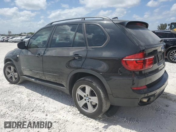 2013 BMW X5 xDrive35i z VIN 5UXZV4C58D0B21356, wystawiony jako Copart lot #54872375 z przebiegiem 113 825 mil mil oraz Szkoda całkowita • Salvage title. Historia ofert i sprzedaży dostępna na DreamBid. Obrazek 2.