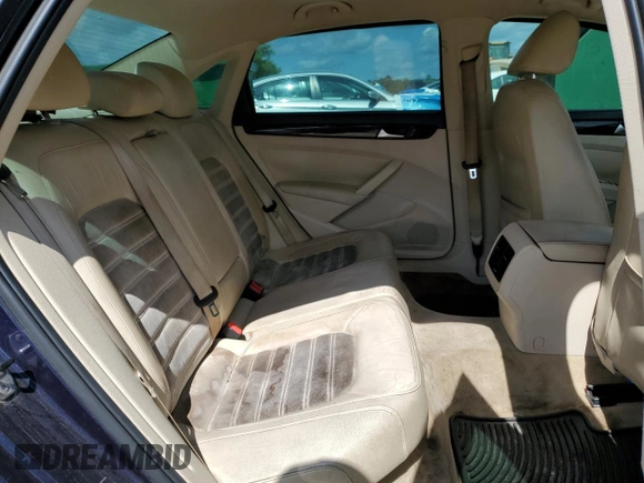 2014 Volkswagen Passat SEL Premium with VIN 1VWCN7A32EC018096, listed as a Copart auction lot 56972805 with 118,515 mi miles and Non repairable. Bid and sale history available at DreamBid. Image 10.