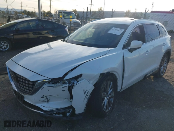 2021 Mazda CX-9 Signature with VIN JM3TCBEY6M0536883, listed as a IAAI auction lot 41388130 with 65,613 mi miles. Bid and sale history available at carsss.com. Image 17.