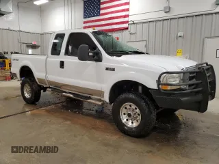 1999 Ford F-250 XL with VIN 1FTNX21F6XEB82414, listed as a Copart auction lot 54253205 with 298,065 mi miles and Clean title. Bid and sale history available at DreamBid. Image 4.