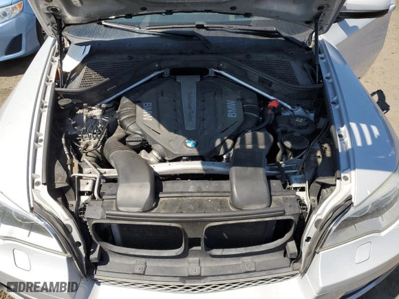 2013 BMW X6 xDrive50i with VIN 5UXFG8C57DL591913, listed as a Copart auction lot 64907674 with 113,611 mi miles and Salvage Title. Bid and sale history available at carsss.com. Image 12.