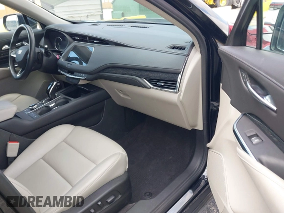 2023 Cadillac XT4 FWD Premium Luxury with VIN 1GYFZCR44PF170452, listed as a IAAI auction lot 42084960 with 22,212 mi miles and . Bid and sale history available at DreamBid. Image 5.