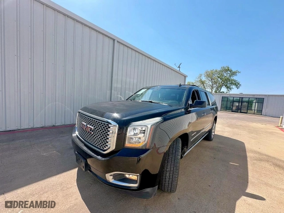 2015 GMC Yukon XL Denali with VIN 1GKS2JKJ5FR282675, listed as a Copart auction lot 52463365 with 221,109 mi miles and Clean Title. Bid and sale history available at carsss.com. Image 2.