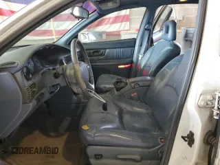 1998 Buick Regal LS with VIN 2G4WB52K5W1415761, listed as a Copart auction lot 55811595 with 102,133 mi miles and Salvage title. Bid and sale history available at DreamBid. Image 7.