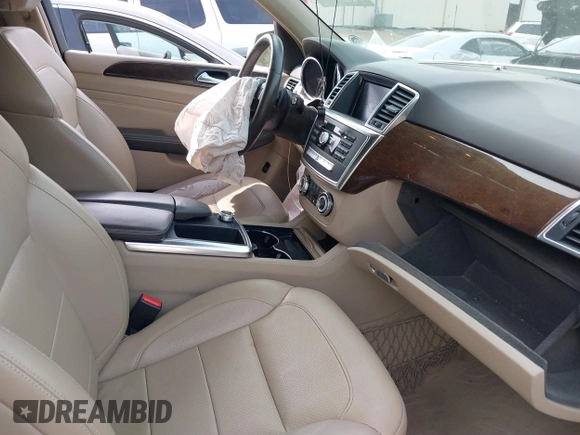 2013 Mercedes-Benz M 350 z VIN 4JGDA5JB0DA166235, wystawiony jako IAAI lot #41876753 z przebiegiem 166 196 mil mil oraz . Historia ofert i sprzedaży dostępna na DreamBid. Obrazek 5.