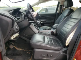 2016 Ford Escape SE z VIN 1FMCU9G9XGUC27074, wystawiony jako Copart lot #55788625 z przebiegiem 106 990 mil mil oraz Szkoda całkowita • Salvage title. Historia ofert i sprzedaży dostępna na DreamBid. Obrazek 7.