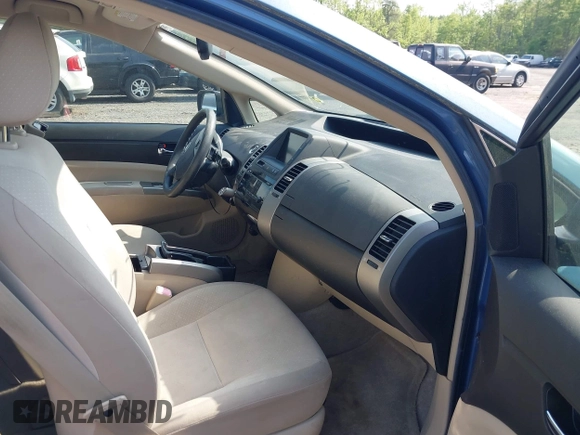 2005 Toyota Prius with VIN JTDKB22U457035511, listed as a IAAI auction lot 42175447 with 142,840 mi miles. Bid and sale history available at carsss.com. Image 5.