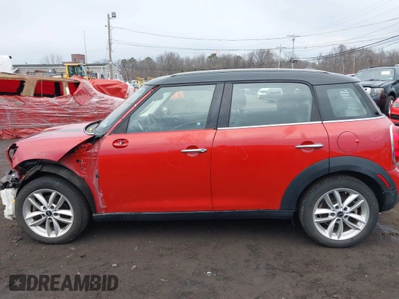 2013 MINI Cooper Countryman with VIN WMWZB3C57DWM07565, listed as a IAAI auction lot 41655938 with 62,694 mi miles. Bid and sale history available at carsss.com. Image 14.