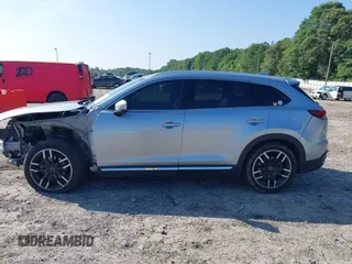 2016 Mazda CX-9 Signature with VIN JM3TCBEY7G0120023, listed as a IAAI auction lot 42431039 with 160,276 mi miles and . Bid and sale history available at DreamBid. Image 14.