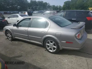 2002 Nissan Maxima GXE z VIN JN1DA31D72T429500, wystawiony jako Copart lot #57996385 z przebiegiem 59 237 mil mil oraz Szkoda całkowita • Salvage title. Historia ofert i sprzedaży dostępna na DreamBid. Obrazek 2.