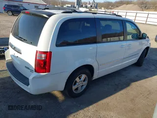 2010 Dodge Grand Caravan SXT with VIN 2D4RN5DX8AR239352, listed as a IAAI auction lot 41773487 with 86,084 mi miles and . Bid and sale history available at DreamBid. Image 4.