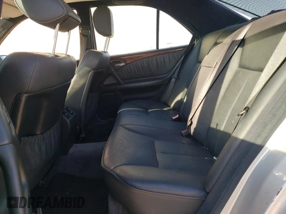 1998 Mercedes-Benz E-Class with VIN WDBJF65F1WA711193, listed as a Copart auction lot 76052034 with 168,935 mi miles and Salvage Title. Bid and sale history available at carsss.com. Image 10.