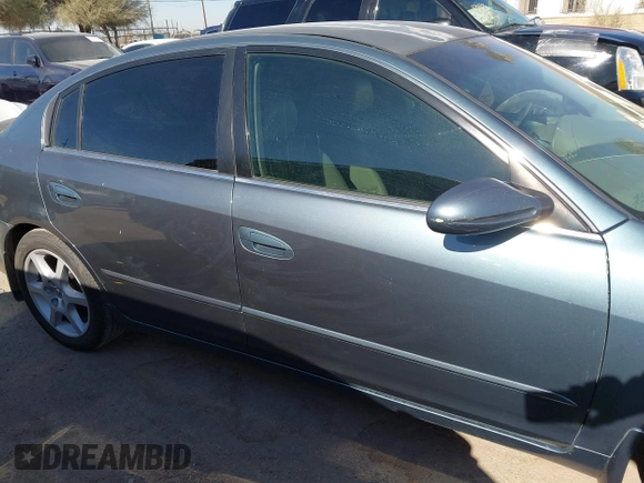 2002 Nissan Altima SE with VIN 1N4BL11D72C700998, listed as a IAAI auction lot 41369017 with 117,148 mi miles. Bid and sale history available at carsss.com. Image 13.