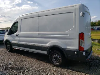 2016 Ford Transit Cargo with VIN 1FTYR2CM1GKA95802, listed as a Copart auction lot 67129054 with 69,590 mi miles and Salvage Title. Bid and sale history available at DreamBid. Image 2.
