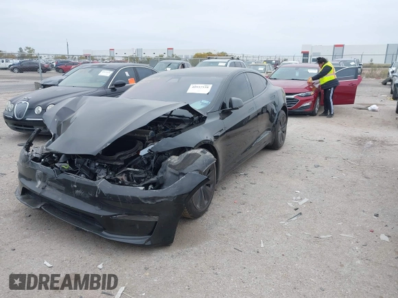 2022 Tesla Model S Plaid with VIN 5YJSA1E65NF484149, listed as a IAAI auction lot 40937538 with 11,459 mi miles and . Bid and sale history available at DreamBid. Image 19.