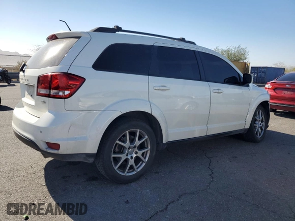2013 Dodge Journey R/T with VIN 3C4PDCEG3DT659001, listed as a Copart auction lot 78187554 with 128,052 mi miles and Salvage title. Bid and sale history available at DreamBid. Image 3.