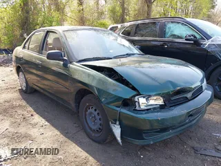 2000 Mitsubishi Mirage DE z VIN JA3AY26C2YU026564, wystawiony jako IAAI lot #42139336 z przebiegiem 53 947 mil mil oraz . Historia ofert i sprzedaży dostępna na DreamBid. Obrazek 6.