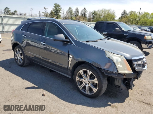 2012 Cadillac SRX Performance Collection with VIN 3GYFNEE34CS590058, listed as a Copart auction lot 54548545 with 122,070 mi miles and Salvage Title. Bid and sale history available at carsss.com. Image 4.
