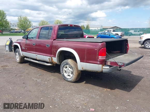 2002 Dodge Dakota z VIN 1B7HG48X92S626936, wystawiony jako IAAI lot #42192429 z przebiegiem 170 746 mil mil oraz . Historia ofert i sprzedaży dostępna na DreamBid. Obrazek 3.