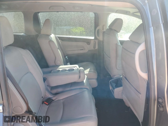 2019 Honda Odyssey EX-L with VIN 5FNRL6H77KB040597, listed as a Copart auction lot 53573445 with 110,024 mi miles and Salvage Title. Bid and sale history available at DreamBid. Image 11.