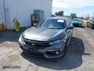 2019 Honda Civic Hatchback Sport with VIN SHHFK7G4XKU208704, listed as a IAAI auction lot 41884349 with 119,113 mi miles. Bid and sale history available at carsss.com. Image 6.