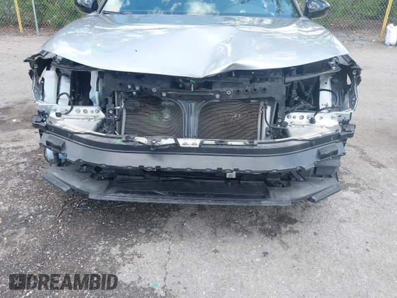 2022 Honda Civic Sport z VIN 2HGFE2F58NH586977, wystawiony jako IAAI lot #42202088 z przebiegiem 56 060 mil mil oraz . Historia ofert i sprzedaży dostępna na DreamBid. Obrazek 6.