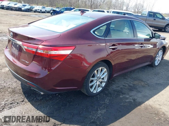 2014 Toyota Avalon Limited with VIN 4T1BK1EB1EU134577, listed as a IAAI auction lot 41994918 with 74,570 mi miles. Bid and sale history available at carsss.com. Image 4.