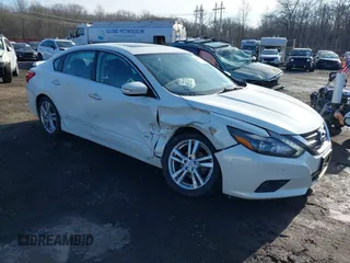 2016 Nissan Altima SL with VIN 1N4BL3AP8GC292573, listed as a IAAI auction lot 41246542 with 33,439 mi miles and . Bid and sale history available at DreamBid. Image 1.