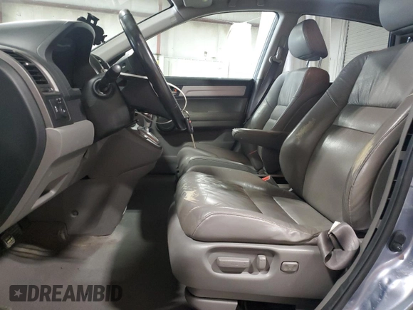 2011 Honda CR-V EX-L z VIN JHLRE4H74BC013467, wystawiony jako Copart lot #56919305 z przebiegiem 166 617 mil mil oraz Szkoda całkowita • Salvage title. Historia ofert i sprzedaży dostępna na DreamBid. Obrazek 7.