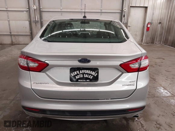 2016 Ford Fusion SE Hybrid z VIN 3FA6P0LU1GR304166, wystawiony jako IAAI lot #41932720 z przebiegiem 68 058 mil mil oraz . Historia ofert i sprzedaży dostępna na DreamBid. Obrazek 17.