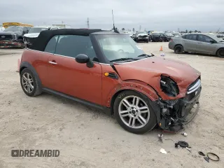 2012 MINI Convertible z VIN WMWZN3C59CT135172, wystawiony jako Copart lot #45593815 z przebiegiem 154 477 mil mil oraz Szkoda całkowita • Salvage title. Historia ofert i sprzedaży dostępna na DreamBid. Obrazek 4.