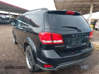 2014 Dodge Journey SXT with VIN 3C4PDCBG1ET127798, listed as a IAAI auction lot 41799898 with 178,873 mi miles and . Bid and sale history available at DreamBid. Image 3.