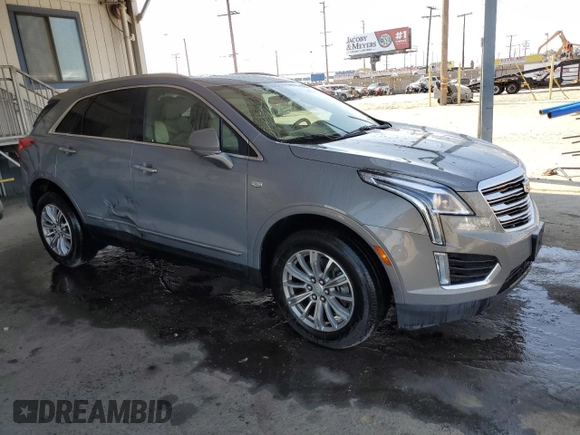2019 Cadillac XT5 Luxury FWD z VIN 1GYKNCRS4KZ221304, wystawiony jako Copart lot #54995415 z przebiegiem 128 940 mil mil oraz Szkoda całkowita • Salvage title. Historia ofert i sprzedaży dostępna na DreamBid. Obrazek 4.