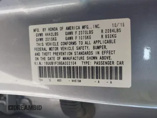 2016 Acura TLX with VIN 19UUB1F38GA002104, listed as a IAAI auction lot 41998966 with 124,159 mi miles. Bid and sale history available at carsss.com. Image 9.