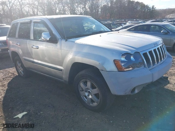 2008 Jeep Grand Cherokee Laredo with VIN 1J8GR48K18C196552, listed as a IAAI auction lot 41280011 with 999,999 mi miles. Bid and sale history available at carsss.com. Image 1.