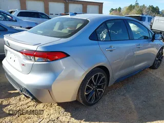 2022 Toyota Corolla SE with VIN JTDS4MCE9N3509473, listed as a IAAI auction lot 41870103 with 39,484 mi miles. Bid and sale history available at carsss.com. Image 4.