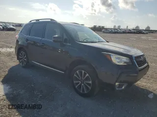 2017 Subaru Forester Touring with VIN JF2SJGWC5HH482107, listed as a Copart auction lot 60975725 with 71,889 mi miles and Salvage title. Bid and sale history available at DreamBid. Image 4.