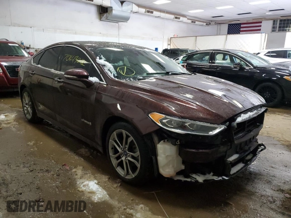 2019 Ford Fusion Hybrid Titanium with VIN 3FA6P0RU2KR211799, listed as a Copart auction lot 70843212 with 54,157 mi miles. Bid and sale history available at carsss.com. Image 4.