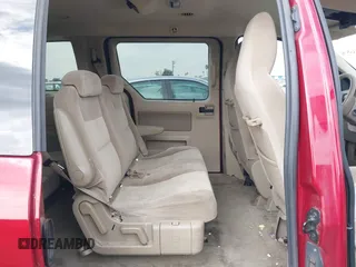 2004 Ford Freestar SES z VIN 2FMZA576X4BA87207, wystawiony jako IAAI lot #41542659 z przebiegiem 101 467 mil mil oraz . Historia ofert i sprzedaży dostępna na DreamBid. Obrazek 8.