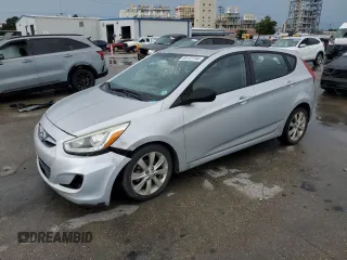 2014 Hyundai Accent SE with VIN KMHCU5AEXEU153005, listed as a Copart auction lot 82825994 with 125,048 mi miles and Salvage Title. Bid and sale history available at carsss.com. Image 1.